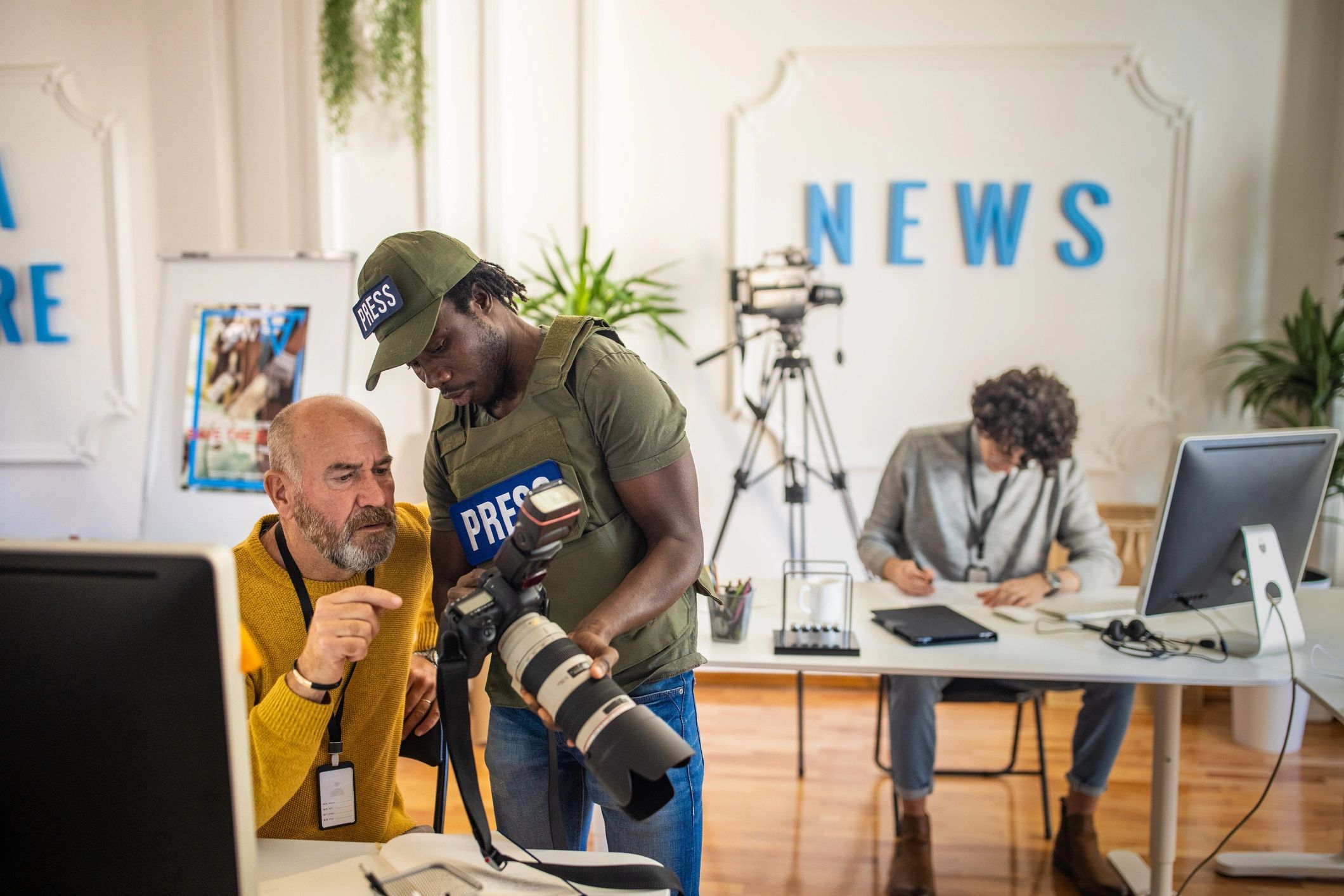 Creator reviewing visual content with a creative partner